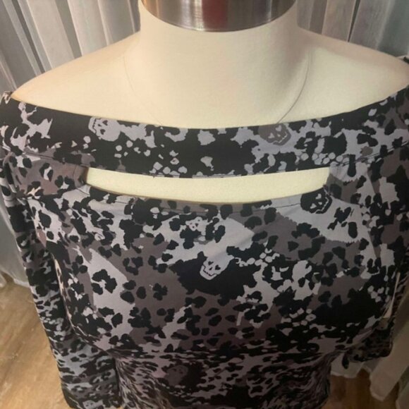 Torrid size 4LoveSick Cold Shoulder Keyhole Tee - Super Soft Black Hiding Skulls - Picture 8 of 10